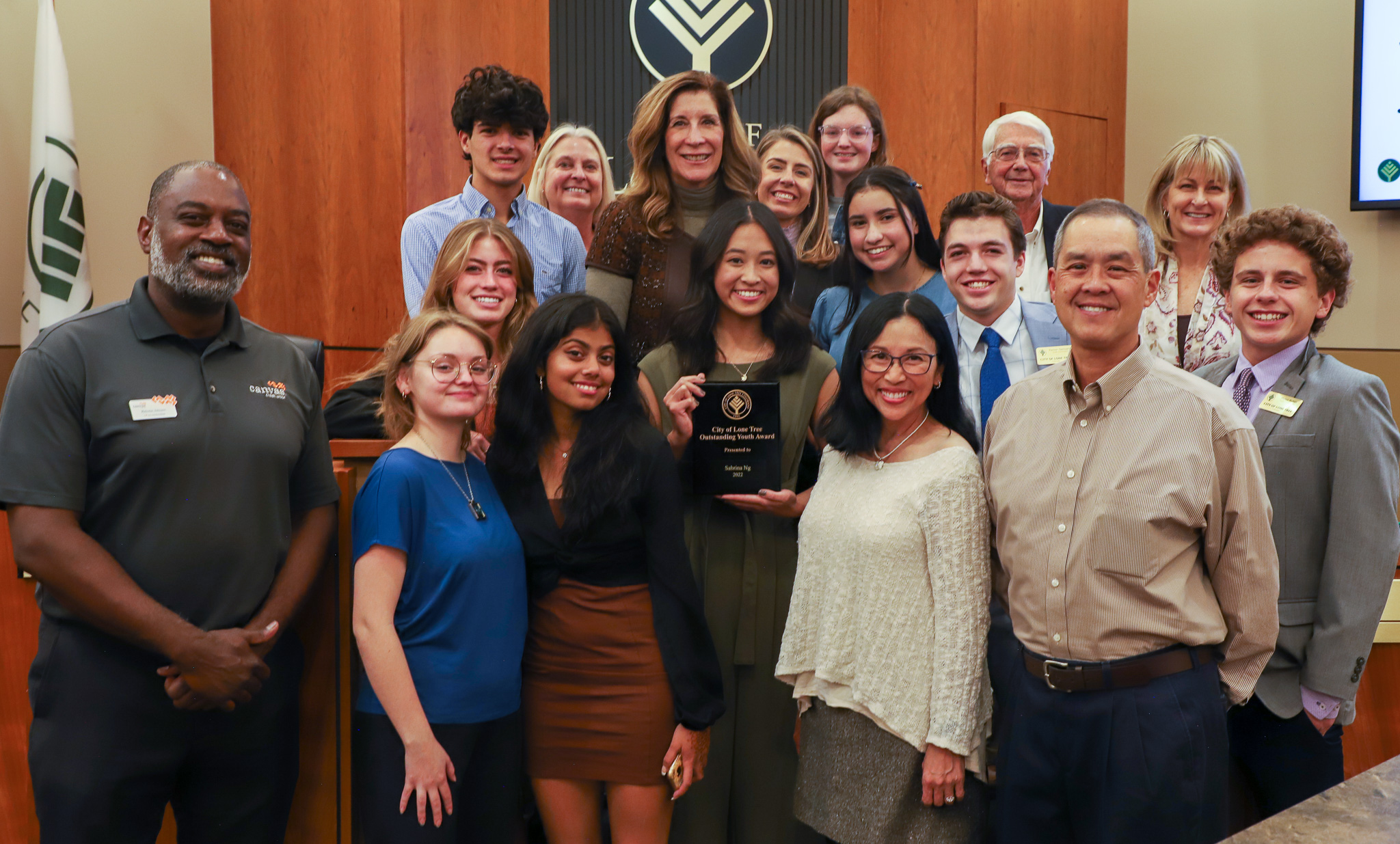 Highlands Ranch High School student Sabrina Ng is awarded the 2022 Outstanding Youth of Lone Tree Award and poses with Lone Tree City Council and Youth Commission.